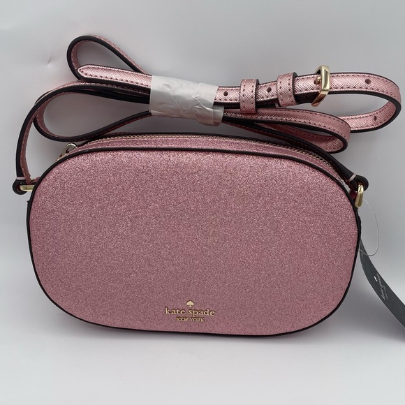 kate spade Handbags - Kate Spade Pink Glimmer Oval Crossbody Camera Bag NWT